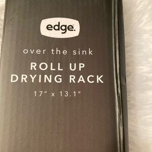 NWTs.  Grey Roll-Up Over-Sink Drying Rack